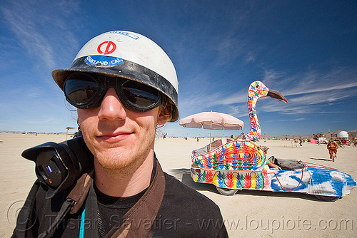 burning man - neil girling - mr nightshade, art car, attire, burning man art cars, burning man outfit, camera, goggles, helmet, mutant vehicles, neil girling, nightshade, photographer