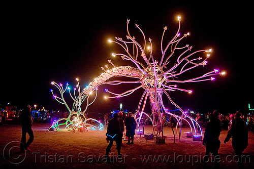burning man - neuron sculpture, art installation, burning man at night, dendrites, glowing, neurone, soma