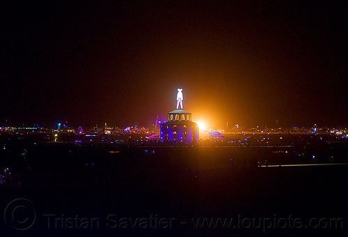 burning man - night panorama with "the man", burning man at night, glowing, the man