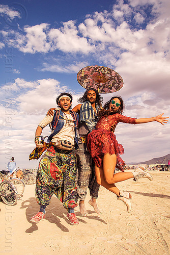 burning man - people jumping, attire, burning man outfit, danielle, jump shot, men, umbrella, woman