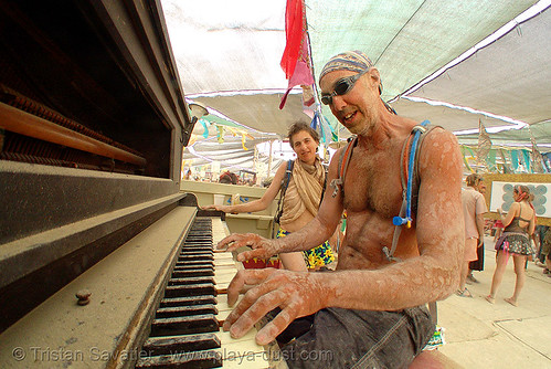 burning man - piano player, man, piano player