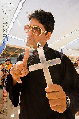 burning man - priest with cross by blinky elvis, blinky elvis, cross, elvis impersonator, man, priest, sunglasses