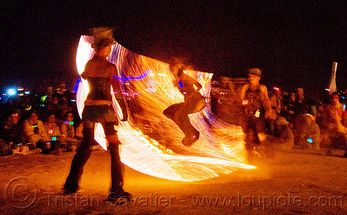 burning man - procession ceremonial flame - fire conclave - fire jumping rope, burning man at night, fire conclave, fire dancer, fire dancing, fire jumping rope, fire performer, fire rope, fire spinning, night of the burn, rope jumping, skipping rope, spinning fire