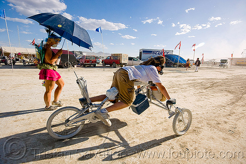 burning man - push-up trike - tricycle, man, push-ups, trike, umbrella