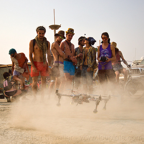 burning man - quadcopter landing - remote controlled drone, drone, dust, flying, landing, men, multicopter, quadcopter, quadrocopter, quadrotor helicopter, rc, remote controlled, uav, unmaned aerial vehicle, video camera, virtual reality goggles, vr goggles