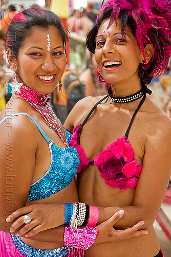 burning man - sacha and annie, annie, bindis, feather hat, feathers, sacha, woman