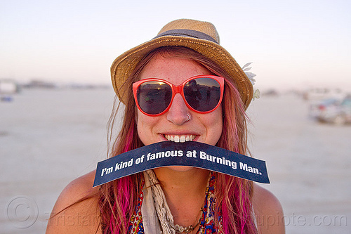 burning man - sari blum, bumper sticker, famous people, hat, red sunglasses, sari, woman