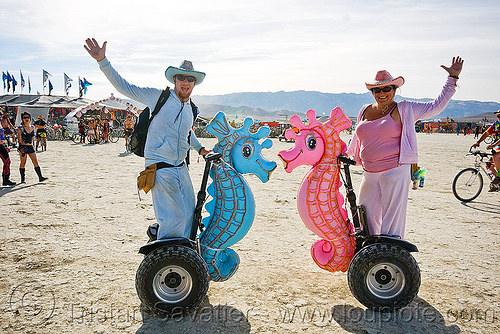 burning man - seahorses segway lovers, blue, hats, inflatables, love, man, pink, seahorses, segway x2, segways, woman