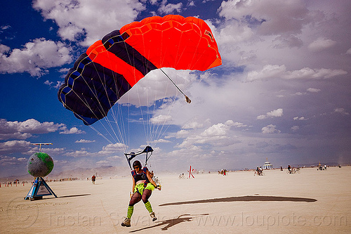 burning man - skydiver touching down, burning sky, landing, parachute, parachutist, skydiver, touch-down