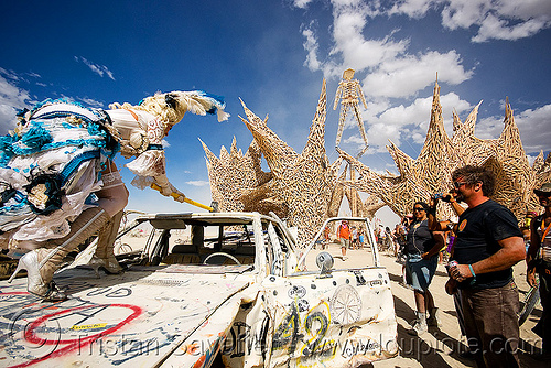 burning man - smashing a car, art car, burning man art cars, car hood, hammer, marie antoinette, mutant vehicles, smashing, wreck, wrecking, yanina