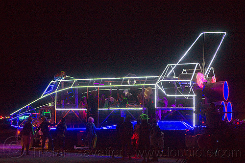 burning man - space shuttle, burning man art cars, burning man at night, disco space shuttle art car, glowing, mutant vehicles