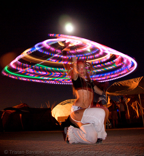 burning man - spinning a led hulahoop, burning man at night, full moon, glowing, hula hoop, led hoop, led lights, light hoop