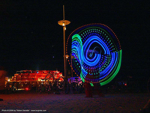 burning man - spinning light poi, burning man at night, glowing, light poi, light spinning