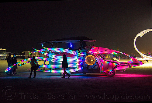 burning man - squid art car, burning man art cars, burning man at night, glowing, mutant vehicles, squid art car, squidcar