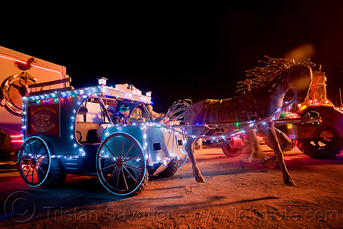 burning man - stagecoach art car, burning man art cars, burning man at night, horse carriage, mutant vehicles, stagecoach, unidentified art car