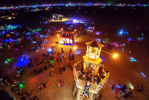 burning man - the lighthouse, art installation, black rock lighthouse, burning man at night, fire, glowing, light house