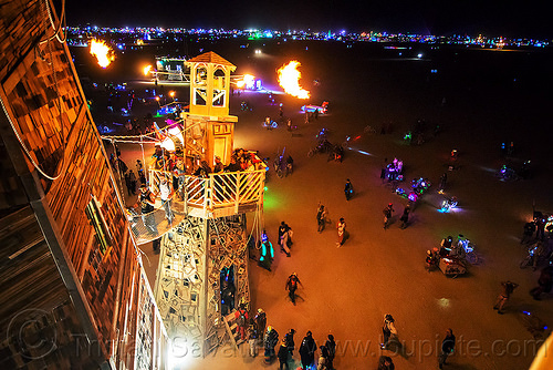 burning man - the lighthouse, art installation, black rock lighthouse, burning man at night, fire, glowing, light house