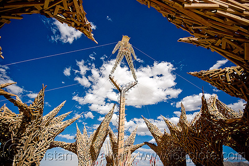 burning man - the man, cables, clouds, the man