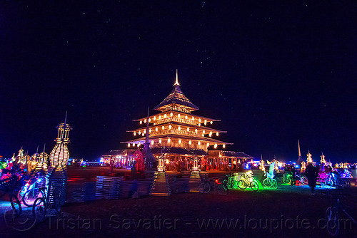 burning man - the temple at night - glowing bicycles, bicycles, burning man at night, burning man temple, glowing