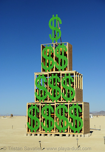 burning man - think green, art installation, dollars, pyramid, think green