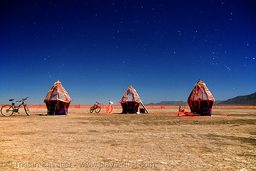 burning man - this installation is called "eggs", art installation, burning man at night, eggs, felonius asparagus, huts, orion, stars, the hunter