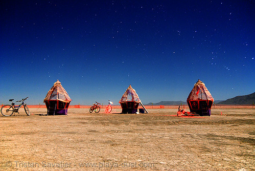 burning man - this installation is called "eggs", art installation, burning man at night, eggs, felonius asparagus, huts, orion, stars, the hunter