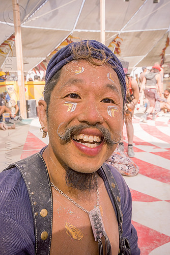 burning man - tim laurel at center camp, dusty, man, mustache, necklace, tim