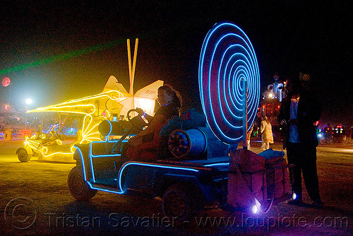 burning man - unidentified art car, burning man art cars, burning man at night, glowing, mutant vehicles, unidentified art car