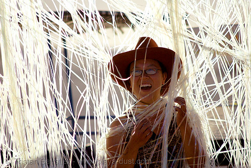 burning man - unidentified art piece on the playa, woman