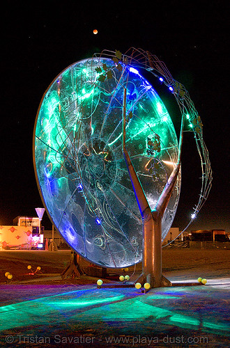 burning man - unidentified art piece on the playa, art installation, burning man at night, chuck napfzinger, eclise, full moon, lunar eclipse, moon eclipse