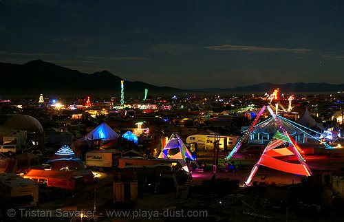 burning man - view of black rock city at night, burning man at night, glowing