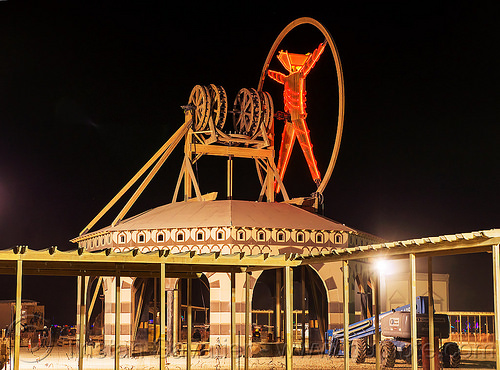 burning man - vitruvian man with its gears, burning man at night, the man, vitruvian man