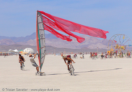 burning man - windsurfing on the playa - landsailing, landsailing, streamer flags, streamers, street sailing, windsurfing