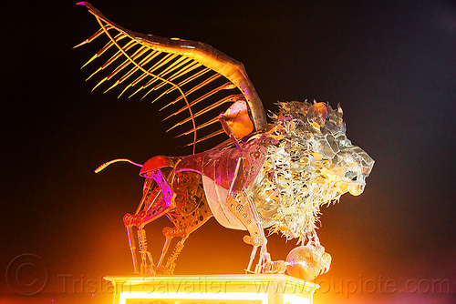 burning man - winged lion, burning man at night, metal sculpture, winged lion