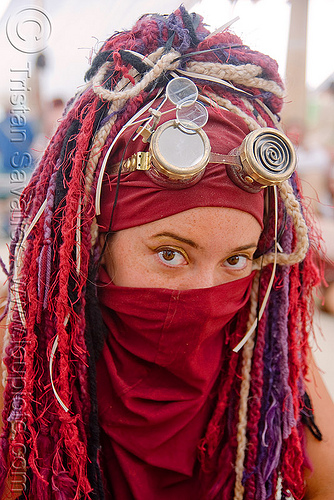 burning man - woman burner at center camp cafe - sarah walker, loupes, magnifiers, magnifying glasses, sarah walker, steampunk, woman