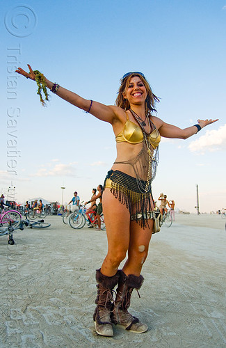 burning man - woman calling the full moon to rise, arms spread out, arms spread wide, attire, brooke bryant, burning man outfit, fringes, woman
