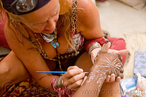 burning man - woman doing body painting, body art, body paint, body painting, woman