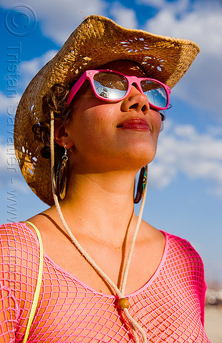 burning man - woman in pink fishnet, attire, burning man outfit, fishnet clothing, fishnet top, straw hat, sunglasses, timecycle, woman