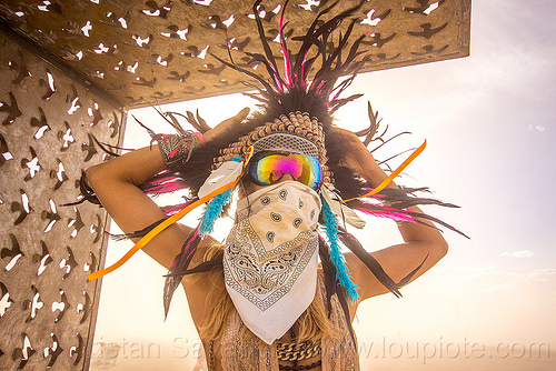 burning man - woman with feather headdress, attire, bandana, burning man outfit, dust storm, face mask, feather headdress, feathers, pia, white out, windy, woman