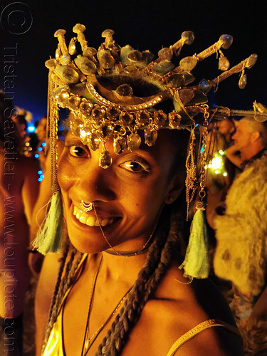 burning man - woman with headdress near man's burn, attire, burning man at night, burning man outfit, headdress, woman