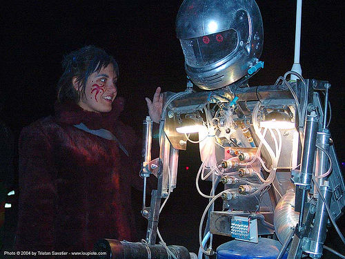 burning man - woman with hotshot the robot, bot, burning man at night, hot shot, hotshot the robot, robotic