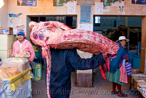 butcher carrying a quarter of beef - uyuni (bolivia), beef, bolivia, butcher, delivery, man, meat market, meat shop, raw meat, uyuni