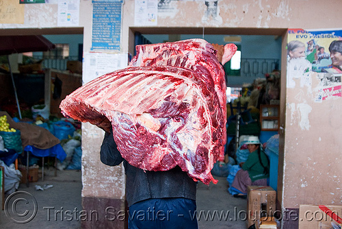 butcher carrying a quarter of beef - uyuni (bolivia), beef, bolivia, butcher, delivery, man, meat market, meat shop, raw meat, uyuni