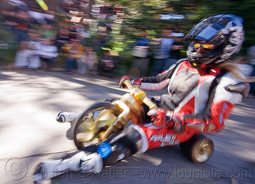 byobw - "bring your own big wheel" race - toy tricycles (san francisco), big wheel, byobw 2011, drift trikes, full face helmet, motorcycle helmet, motorcycle racer costume, moving fast, potrero hill, race, speed, speeding, toy tricycle, toy trike, trike-drifting