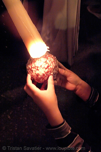 candle dripping wax on wax ball - semana santa en sevilla, candles, easter, el museo, hermandad del museo, nazarenos, night, semana santa, sevilla, wax ball