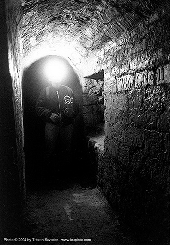 catacombes de paris - catacombs of paris (off-limit area) - 1786 - caroline dagneau, 1786, acetylene, carbide lamp, cataphile, cave, clandestines, illegal, low key, trespassing, tunnel, underground quarry, vault, voute