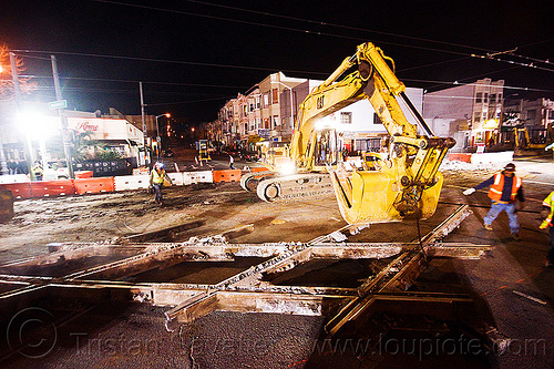 caterpillar 322l excavator, at work, cat 322l, diamond crossing, excavator, high-visibility jacket, high-visibility vest, light rail, man, muni, ntk, overhead lines, railroad construction, railroad tracks, railway tracks, reflective jacket, reflective vest, safety helmet, safety vest, san francisco municipal railway, track maintenance, track work, worker, working