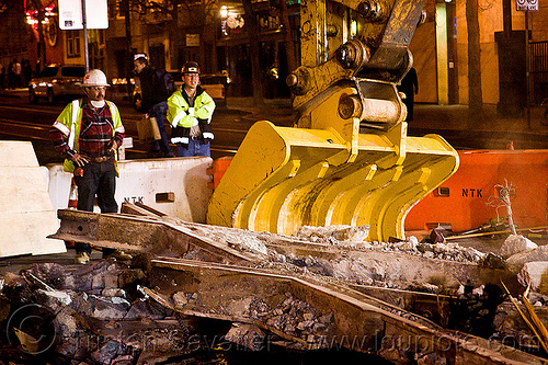 caterpillar 322l excavator shovel attachment, at work, cat 322l, demolition, excavator, high-visibility jacket, high-visibility vest, light rail, man, muni, ntk, railroad construction, railroad tracks, railway tracks, reflective jacket, reflective vest, safety helmet, safety vest, san francisco municipal railway, track maintenance, track work, worker, working