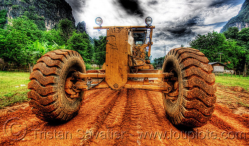 caterpillar cat 14g (140g) grader - road construction (laos), at work, cat 14g, cat grader, caterpillar 140g, caterpillar 14g road grader, caterpillar road grader, engine, groundwork, motor grader, mud tires, preparation, road construction, roadworks, working, yellow