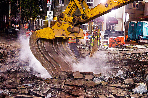 caterpillar excavator bucket, at work, bucket attachment, cat 326l, demolition, dust, excavator bucket, light rail, muni, night, ntk, pavement, railroad construction, railroad tracks, railway tracks, san francisco municipal railway, track maintenance, track work, working